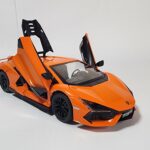 Bright orange 1:24 scale Lamborghini style hypercar die-cast model with its iconic scissor doors open, showing the aggressive front end and black wheels. Khilone for kids